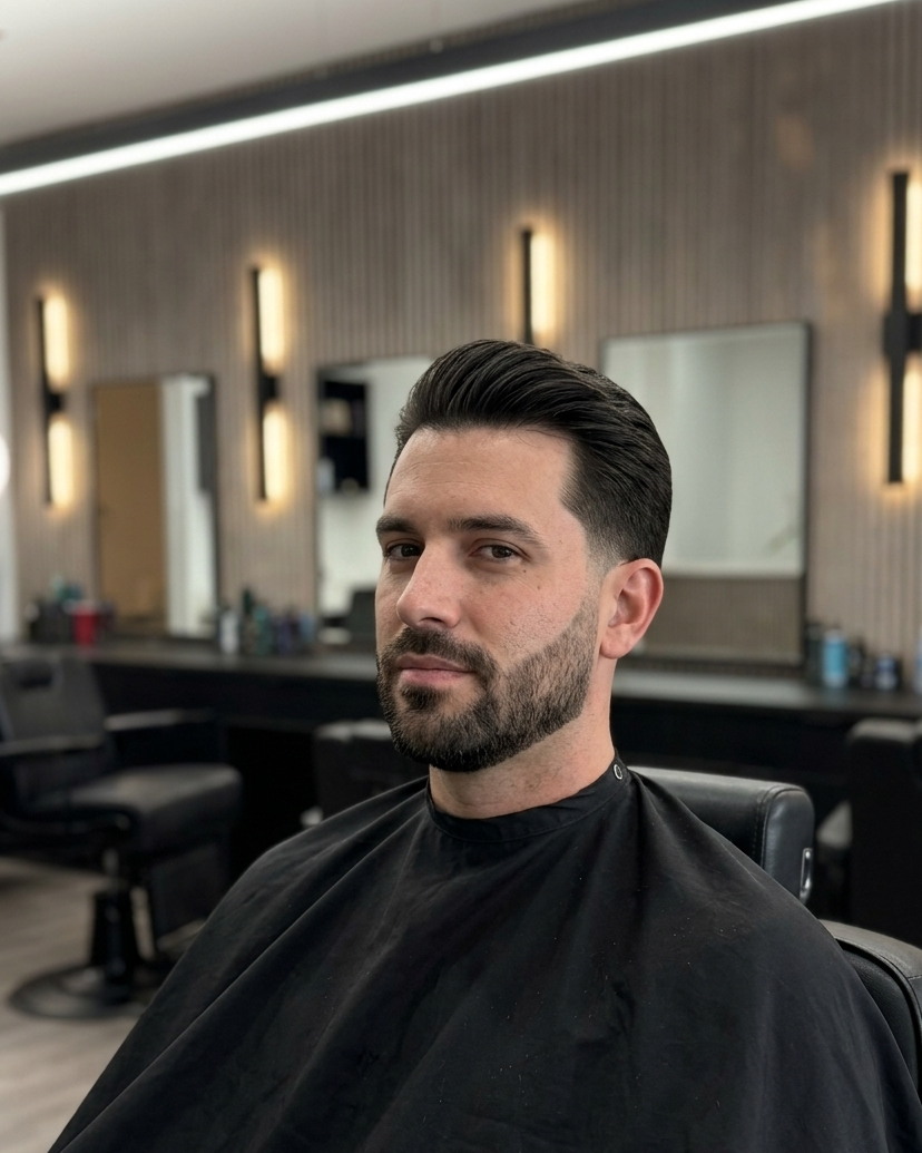 A classic scissor cut with a shaped beard